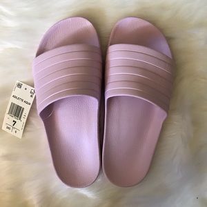 pink adilette slides